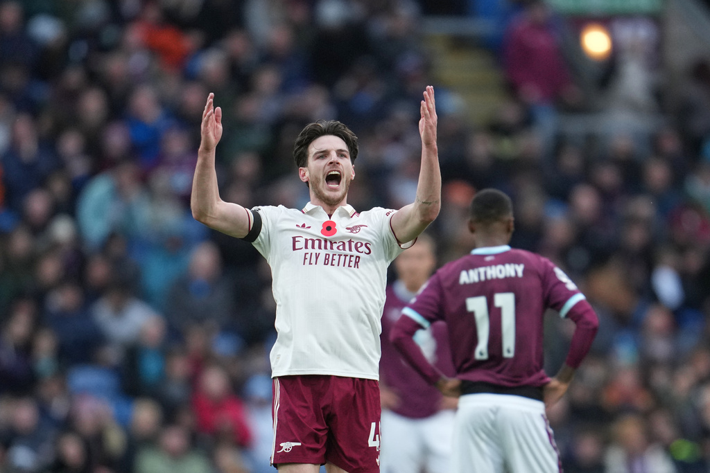 Arsenal's Declan Rice celebrates after scoring his side's second goal during the English Premier League soccer match between Burnley and Arsenal in Burnley, England, Saturday, Nov. 1, 2025. (AP Photo/Jon Super)