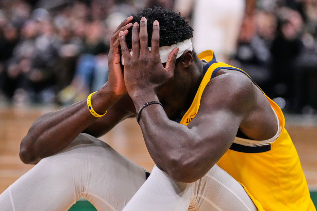 Indiana Pacers forward Pascal Siakam (43) reacts after committing a foul against the Boston Celtics during the first half of an NBA basketball game, Wednesday, Jan. 21, 2026, in Boston. (AP Photo/Charles Krupa)