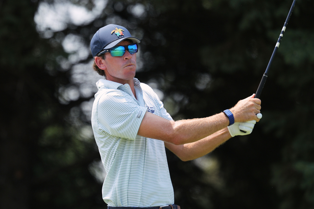 FILE - Ben Kohles reacts after his shot from the second tee during the final round of the 3M Open golf tournament at the Tournament Players Club, July 26, 2026, in Blaine, Minn. (AP Photo/Bailey Hillesheim, File)