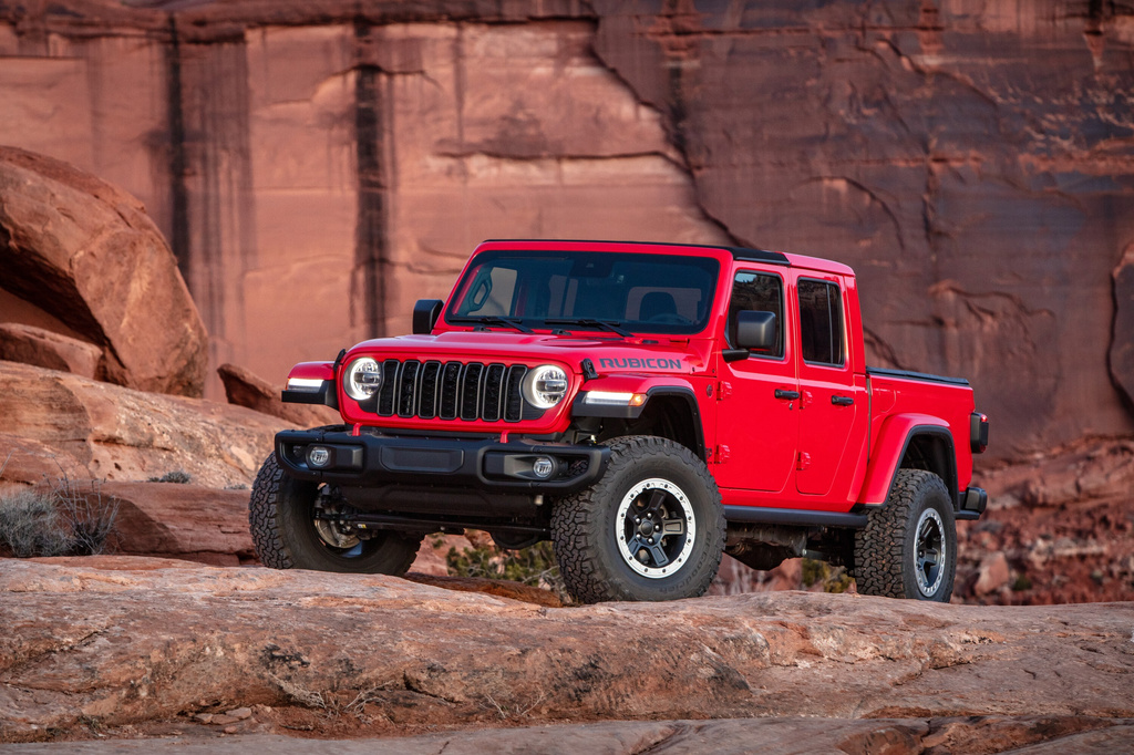 This photo provided by Jeep shows the Gladiator Rubicon pickup. Just like the Wrangler, the Gladiator features a removable roof and doors. (Courtesy of Jeep/Stellantis via AP)