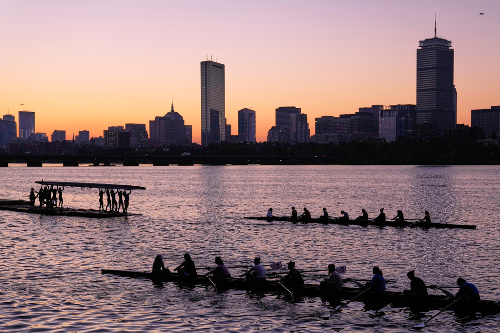 FILE - Crew teams prepare to train at dawn on the Charles River at the Massachusetts Institute of Technology boat house, Oct. 6, 2025, in Cambridge, Mass. (AP Photo/Charles Krupa, File)