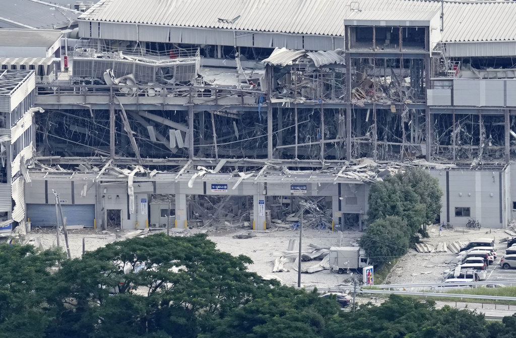 This aerial image shows AEON Mall, which was destroyed by an explosion following an earthquake, in Kashima, Kumamoto Prefecture, on Wednesday, July 29, 2026. (Naoki Hiraoka/Kyodo News via AP)