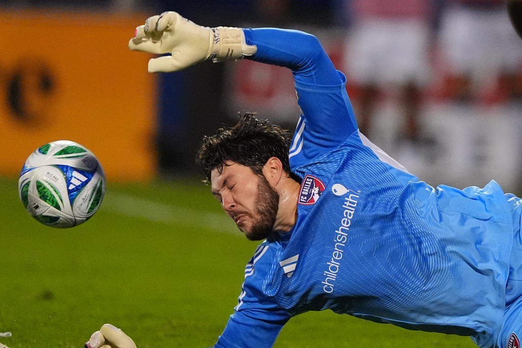 FC Dallas goalkeeper Michael Collodi defends the goal during the first half of Game 2 in the first round of MLS soccer's Western Conference playoffs against the Vancouver Whitecaps in Frisco, Texas, Saturday, Nov. 1, 2025. (AP Photo/LM Otero)