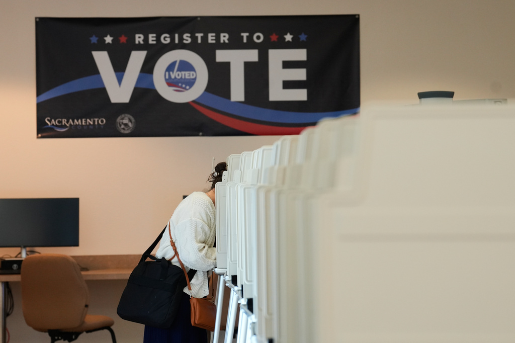 A voter casts her ballot for the California primary election on Tuesday, June 2, 2026, in Sacramento, Calif.. (AP Photo/Rich Pedroncelli)