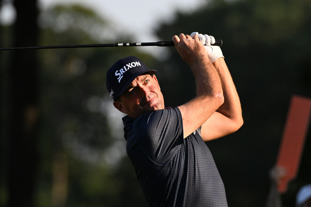 Keegan Bradley hits from the 11th tee during the first round of the Rocket Classic golf tournament at the Detroit Golf Club, Thursday, July 30, 2026, in Detroit. (AP Photo/Jose Juarez)