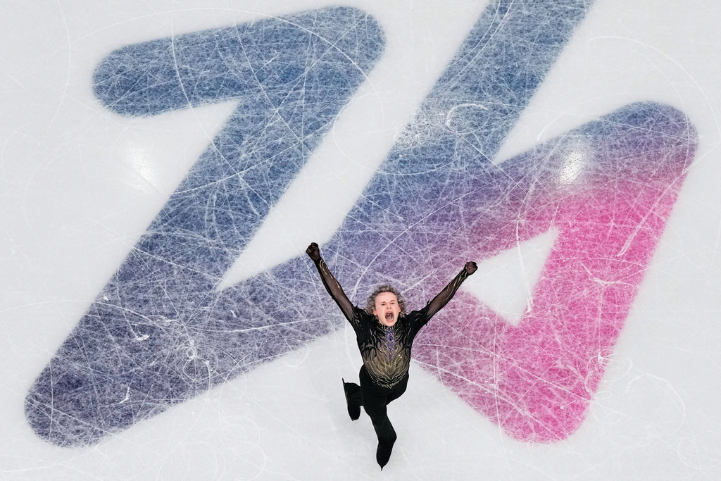 Ilia Malinin of the United States wobbles while competing during the figure skating men's team event at the 2026 Winter Olympics, in Milan, Italy, Sunday, Feb. 8, 2026. (AP Photo/Bernat Armangue)