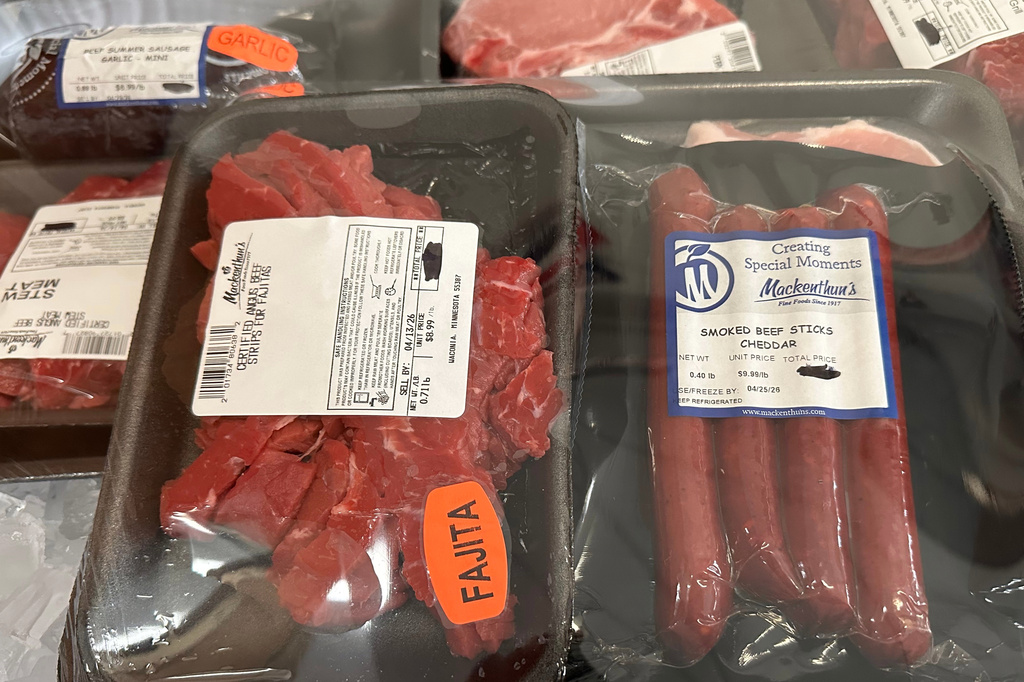 Packages of meat are offered as prizes for a weekly meat raffle April 10, 2026, at American Legion Post 150 in Waconia, Minn. (AP Photo/Steve Karnowski)