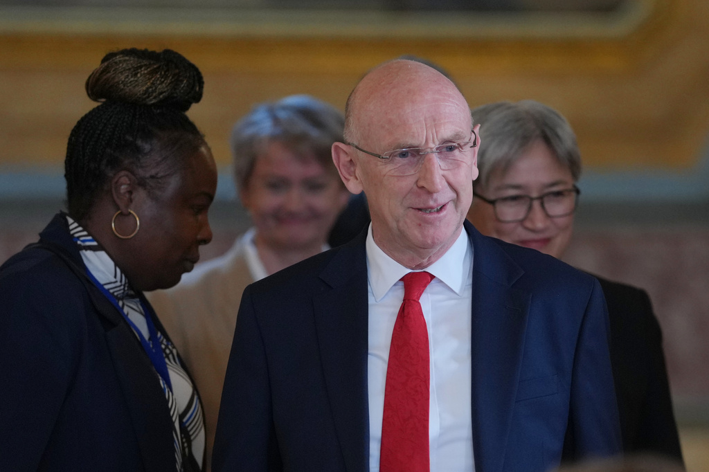 Defence Secretary John Healey walks into the press conference following the AUKMIN Summit, at Lancaster House in London, Wednesday, June 10, 2026. (AP Photo/Kin Cheung, Pool)