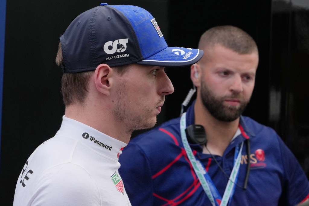 Red Bull driver Max Verstappen of the Netherlands walks out of the FIA office following a crash during the qualifying session for the Australian Formula One Grand Prix at Albert Park, in Melbourne, Australia, Saturday, March 7, 2026. (AP Photo/Asanka Brendon Ratnayake)