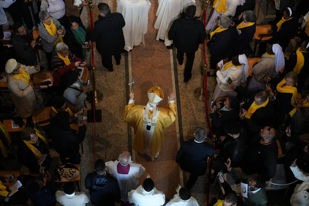 Pope Leo XIV arrives to celebrate a Mass in the Saint Augustine Basilica in Annaba, Algeria, Tuesday, April 14, 2026, on the second day of an 11-day apostolic journey to Africa. (AP Photo/Andrew Medichini)