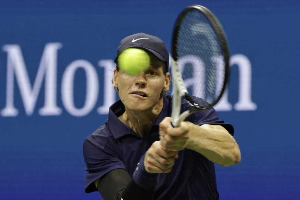 Jannik Sinner, of Italy, returns a shot to Lorenzo Musetti, of Italy, during the quarterfinal round of the U.S. Open tennis championships, Wednesday, Sept. 3, 2025, in New York. (AP Photo/Adam Hunger)