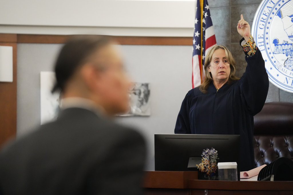 Judge Jessica Peterson, right, presides over the trial of Nathan Chasing Horse, left, on charges of sexually abusing Indigenous women and girls Tuesday, Jan. 13, 2026, in Las Vegas. (AP Photo/Ty ONeil)