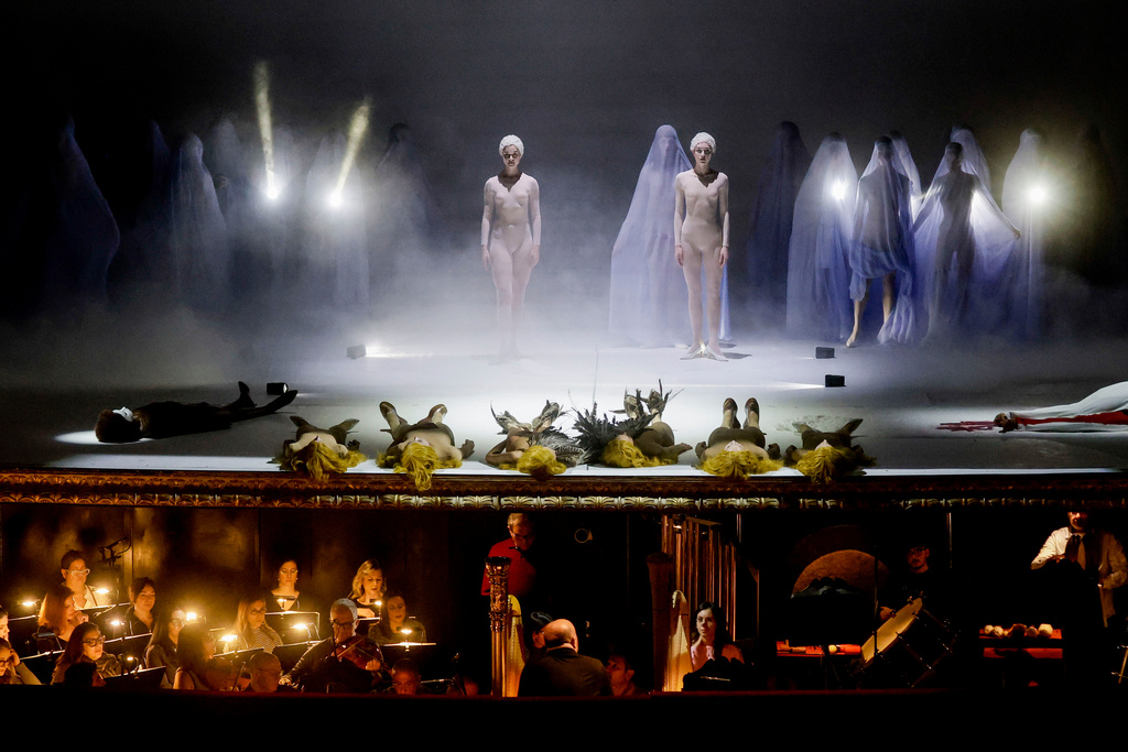 Actors perform during the general rehearsal of Ennio Morricone's only opera, Partenope, at the San Carlo Theatre, in Naples, Italy, Thursday, Dec. 11, 2025. (AP Photo/Salvatore Laporta)