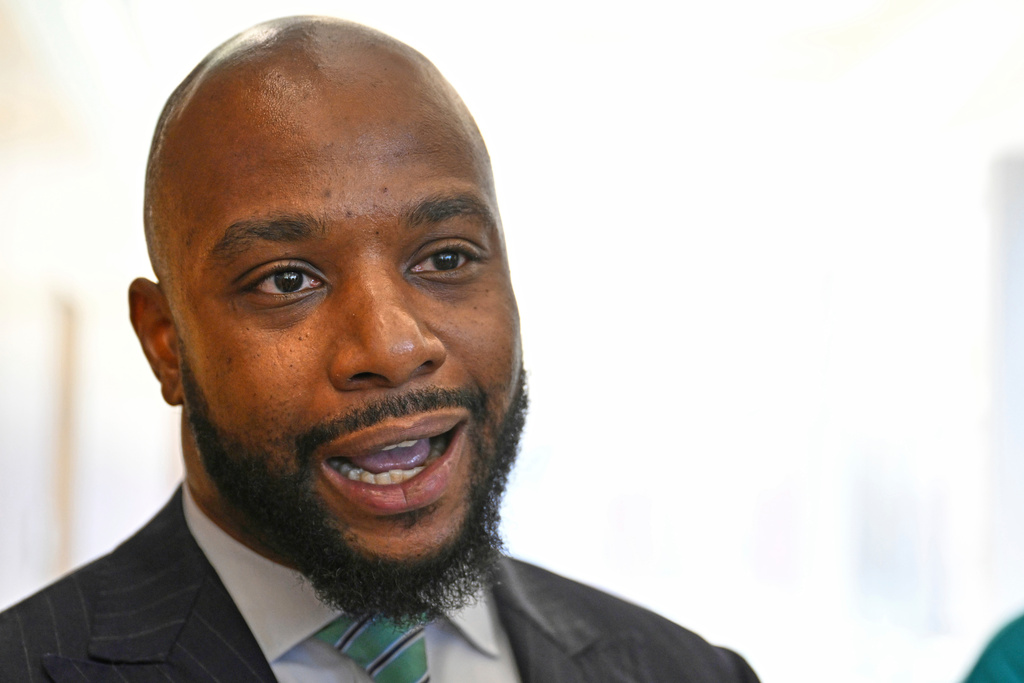 FILE - Sean Walton, attorney for Ta'Kiya Young's family, speaks to reporters after arraignment proceedings of Blendon Township police officer Connor Grubb, Aug. 14, 2024, at the Franklin County Court of Common Pleas in Columbus. (AP Photo/David Dermer, File)