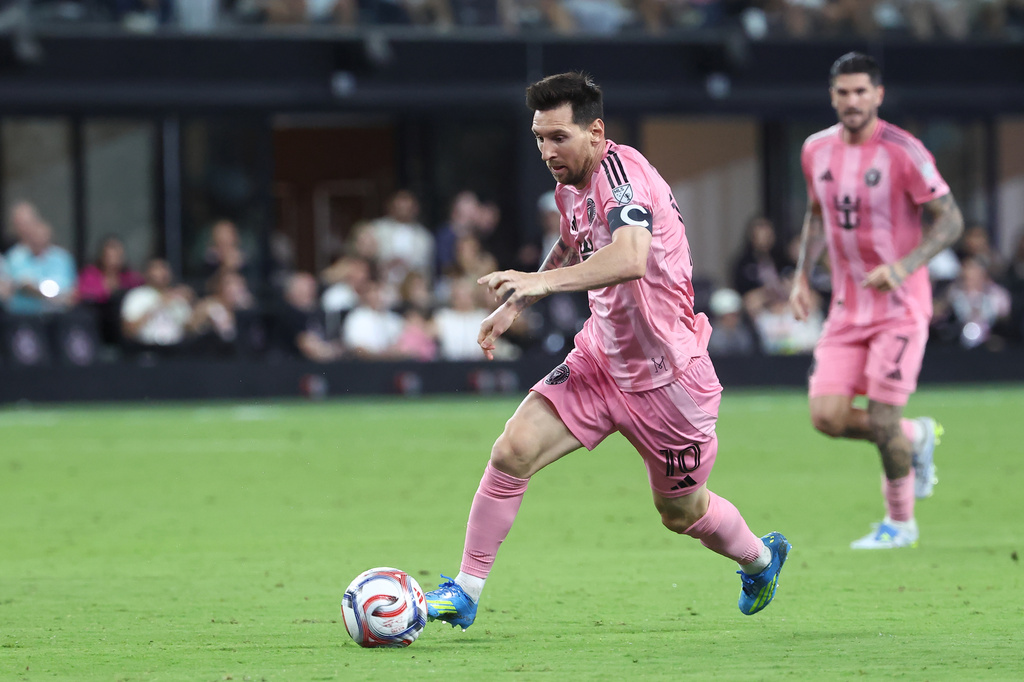 Inter Miami forward Lionel Messi (10) attacks with the ball in the second half of an MLS soccer match against the New York Red Bulls, Saturday, April 11, 2026, in Miami. (AP Photo/Peter Joneleit)