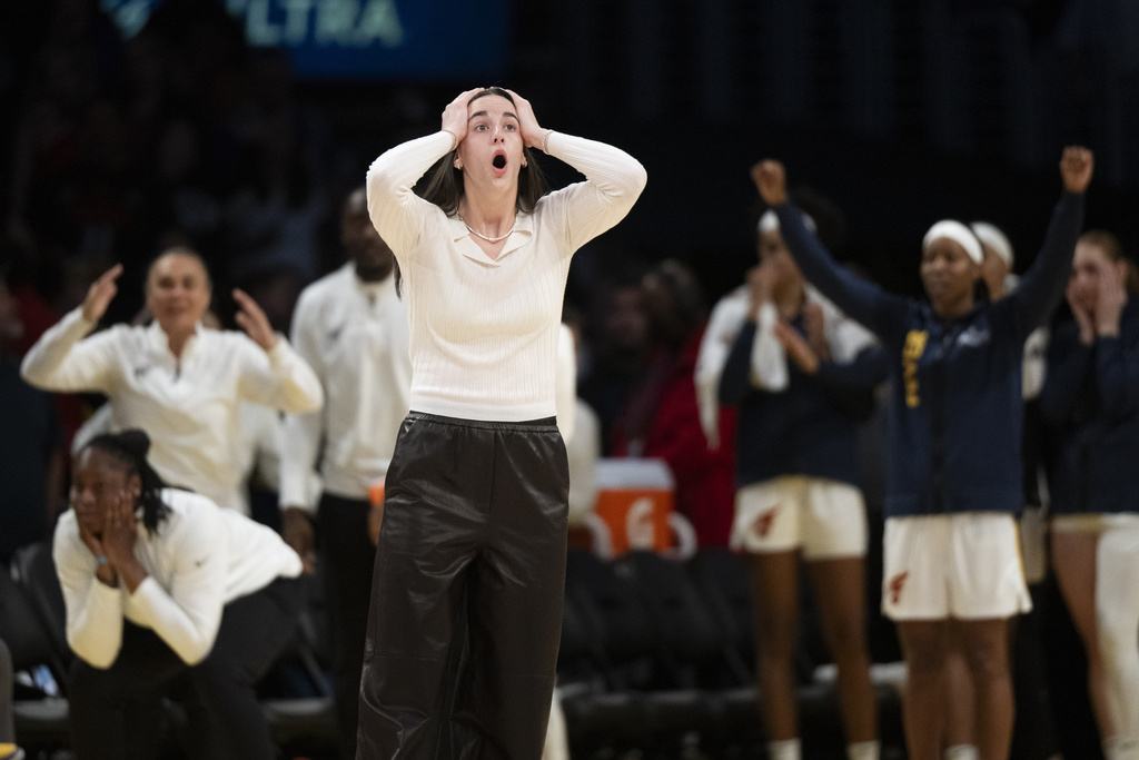 Indiana Fever guard Caitlin Clark reacts on a call by a referee during the second half of a WNBA basketball game against the Los Angeles Sparks, Friday, Aug. 29, 2025, in Los Angeles. (AP Photo/Kyusung Gong)