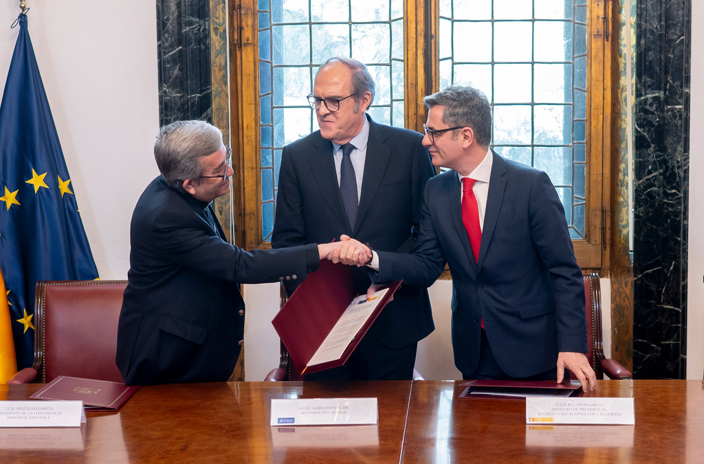 From left, Luis Arguello, the president of the Spanish Episcopal Conference, Angel Gabilondo, the Ombudsman and Felix Bolanos the Minister of the Presidency, Justice and Relations with Parliament after the signing of an agreement to provide redress to victims of time-barred abuse in Madrid, Spain, Monday, March 30, 2026. (Alberto Ortega/Europa Press via AP)