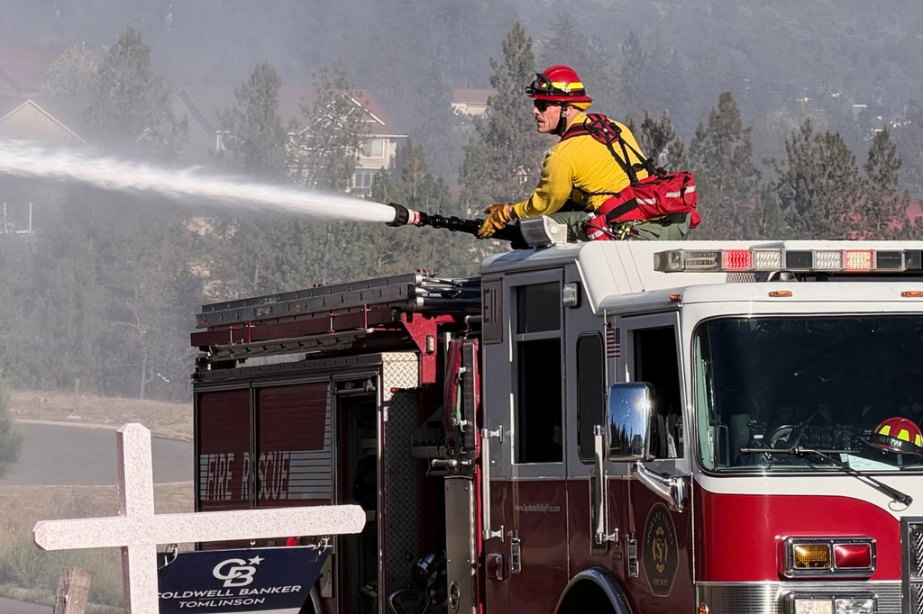 Fire crews battle the Upriver Fire on Tuesday, June 16, 2026, east of Spokane, Wash. (Spokane Valley Fire Department via AP)