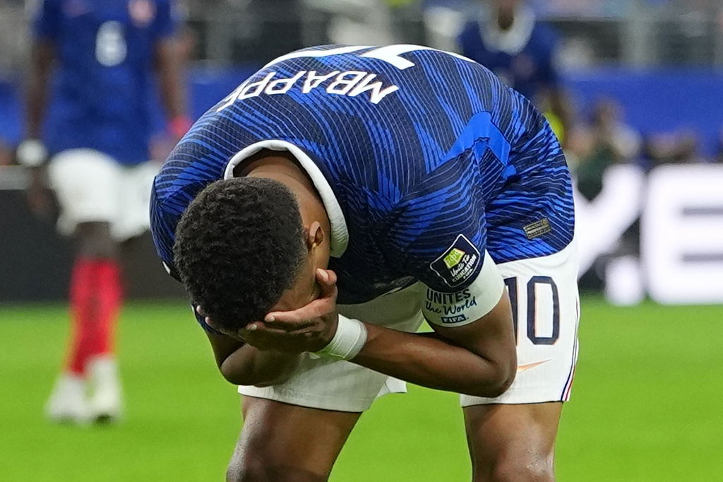 France's Kylian Mbappe reacts during a World Cup semifinal soccer match against Spain in Arlington, Texas, near Dallas, Tuesday, July 14, 2026. (AP Photo/Julio Cortez)