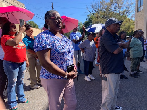A crowd gathers Thursday, Oct. 16, 2025, in downtown Leland, Miss., to hear the latest details on an investigation into a mass shooting that occurred during a homecoming celebration last week. (AP Photo/Sophie Bates) A crowd gathers Thursday, Oct. 16, 2025, in downtown Leland, Miss., to hear the latest details on an investigation into a mass shooting that occurred during a homecoming celebration last week. (AP Photo/Sophie Bates)