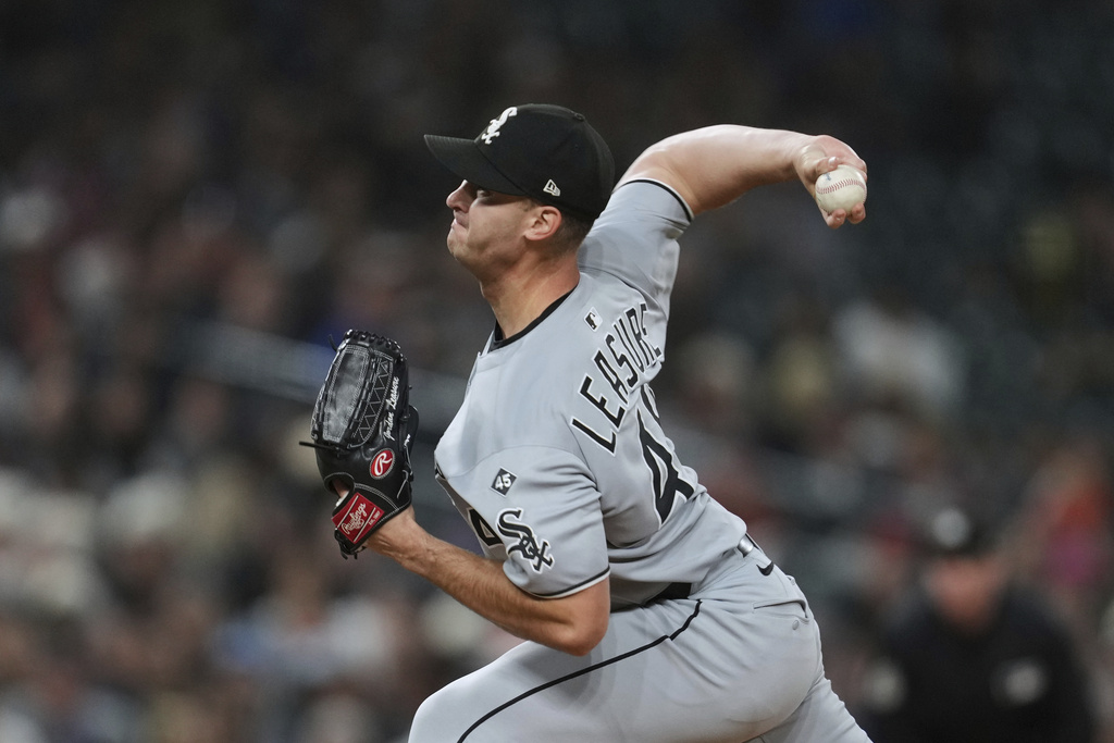 Chicago White Sox pitcher Jordan Leasure throws against the Detroit Tigers in the eighth inning during a baseball game Friday, Sept. 5, 2025, in Detroit. (AP Photo/Paul Sancya)