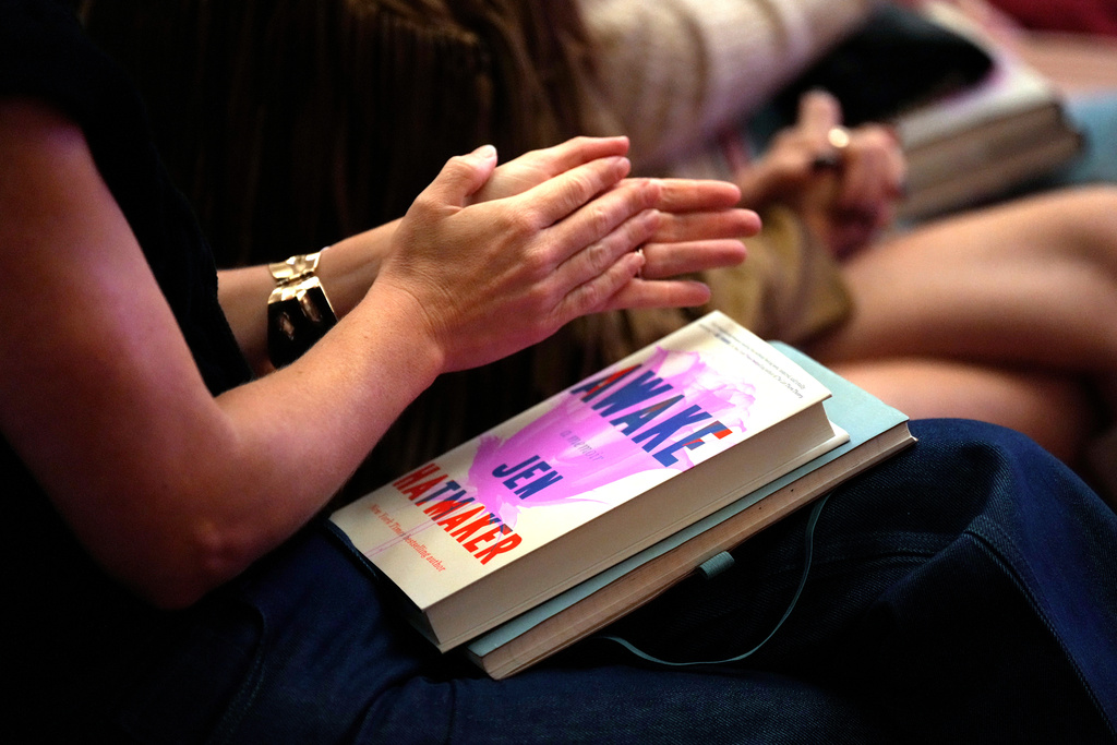 Audience members applaud author and influencer Jen Hatmaker as she talks about her new book, "Awake," in Nashville, Tenn., on Sept. 25, 2025. (AP Photo/Mark Humphrey)