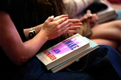 Audience members applaud author and influencer Jen Hatmaker as she talks about her new book, "Awake," in Nashville, Tenn., on Sept. 25, 2025. (AP Photo/Mark Humphrey) Audience members applaud author and influencer Jen Hatmaker as she talks about her new book, "Awake," in Nashville, Tenn., on Sept. 25, 2025. (AP Photo/Mark Humphrey)