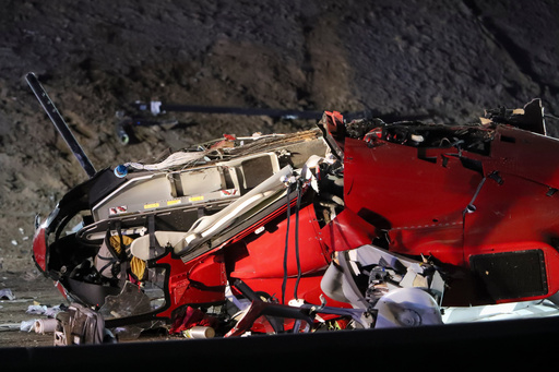A medical helicopter is shown after it crashed on Highway 50 Monday, Oct. 6, 2025, in Sacramento, Calif. (AP Photo/Scott Marshall) A medical helicopter is shown after it crashed on Highway 50 Monday, Oct. 6, 2025, in Sacramento, Calif. (AP Photo/Scott Marshall)