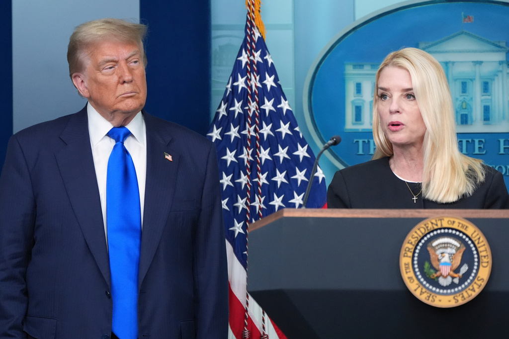 FILE - Attorney General Pam Bondi speaks to reporters as President Donald Trump listens, June 27, 2025, in the briefing room of the White House in Washington. (AP Photo/Jacquelyn Martin, File)
