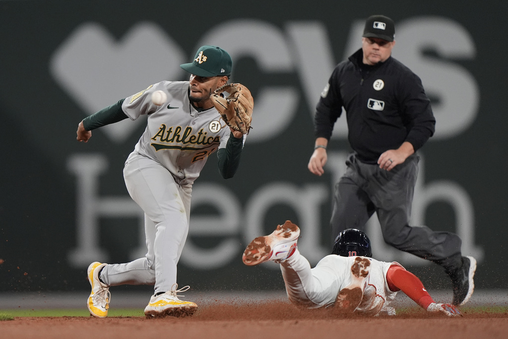 Athletics second baseman Darrell Hernaiz reaches for a late throw on a stolen base by Boston Red Sox Trevor Story in the fifth of a baseball game, Tuesday, Sept. 16, 2025, in Boston. (AP Photo/Robert F. Bukaty)