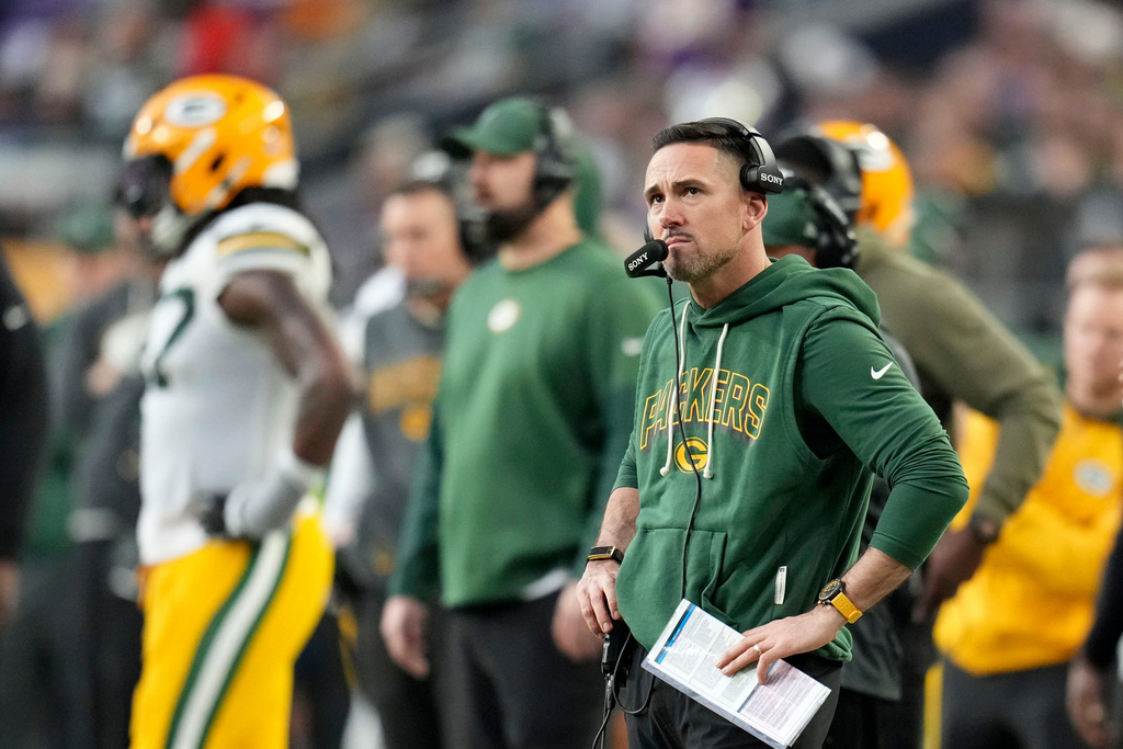 Green Bay Packers head coach Matt Lafleur watches from the sideline during the second half of an NFL football game against the Minnesota Vikings, Sunday, Jan. 4, 2026, in Minneapolis. (AP Photo/Ross D. Franklin)