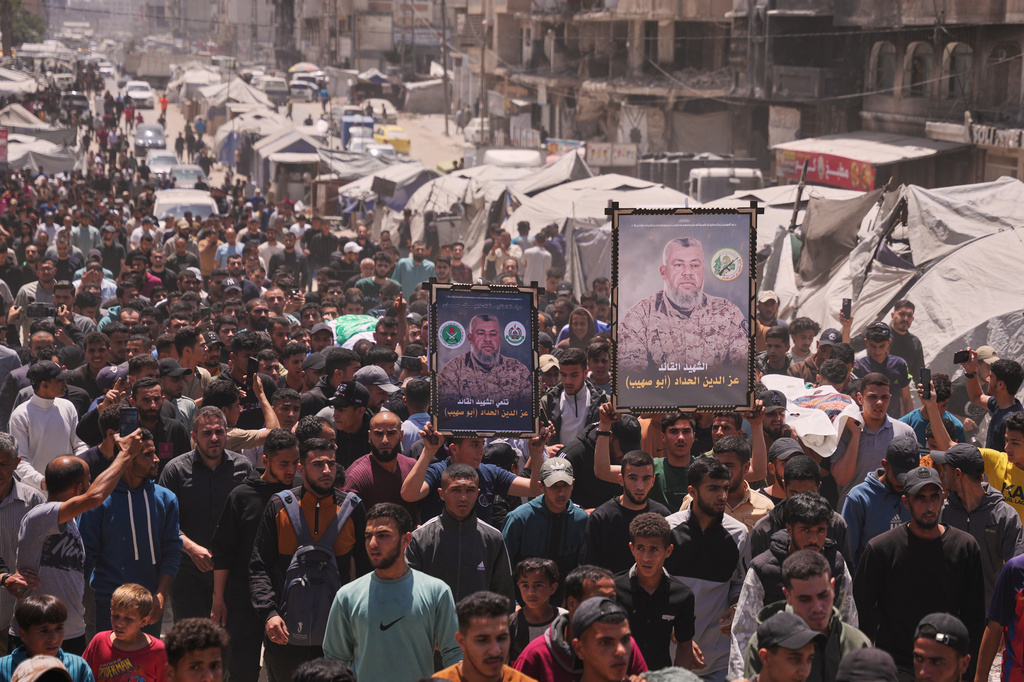 Palestinians attend the funeral of Izz al-Din al-Haddad, the leader of Hamas' Qassam Brigades, and his daughter and wife in Gaza City, Saturday, May 16, 2026. They were killed in an Israeli strike Friday evening. (AP Photo/Abdel Kareem Hana)