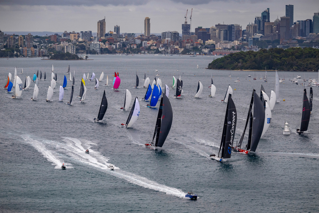In this photo provided by the Cruising Yacht Club of Australia, competitors make a start in the Sydney Hobart yacht race in Sydney, Friday, Dec. 26, 2025. (Kurt Arrigo/CYCA via AP)