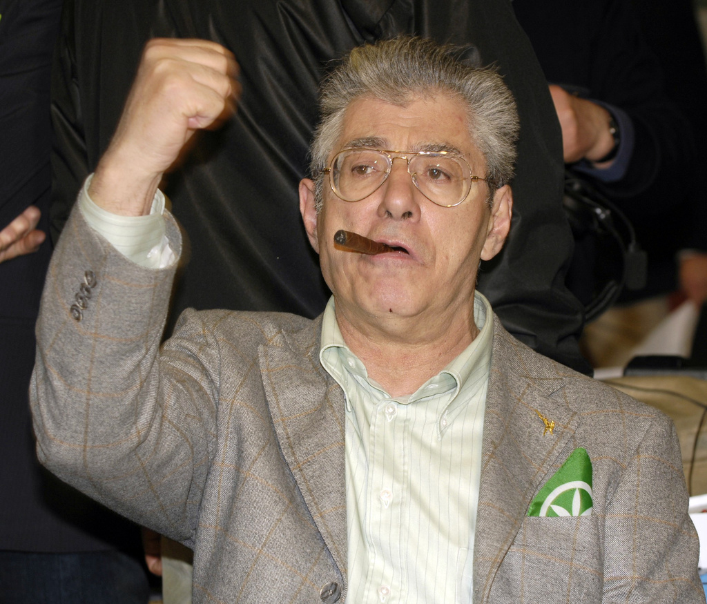 Leader of the Northern League party Umberto Bossi celebrates at the party headquarters in Milan, Italy, April 14, 2008. Bossi died at the age of 84 on Thursday, March 19, 2026. (AP Photo/Luca Bruno, File)