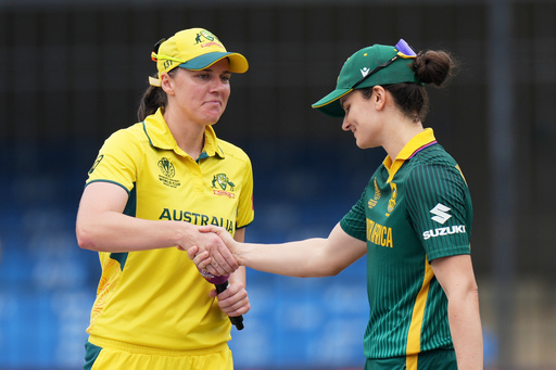 Australia's captain Tahlia McGrath, left, and South Africa's captain Laura Wolvaardt shake hands after toss during the ICC Women's Cricket World Cup match between Australia and South Africa in Indore, India, Saturday, Oct. 25, 2025. (AP Photo/Ajit Solanki) Australia's captain Tahlia McGrath, left, and South Africa's captain Laura Wolvaardt shake hands after toss during the ICC Women's Cricket World Cup match between Australia and South Africa in Indore, India, Saturday, Oct. 25, 2025. (AP Photo/Ajit Solanki)