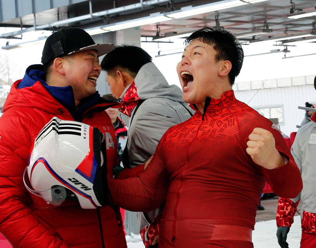 FILE - Driver Won Yunjong of South Korea celebrates tying for the silver medal during the four-man bobsled competition final at the 2018 Winter Olympics in Pyeongchang, South Korea, Sunday, Feb. 25, 2018.(AP Photo/Christophe Ena, File)