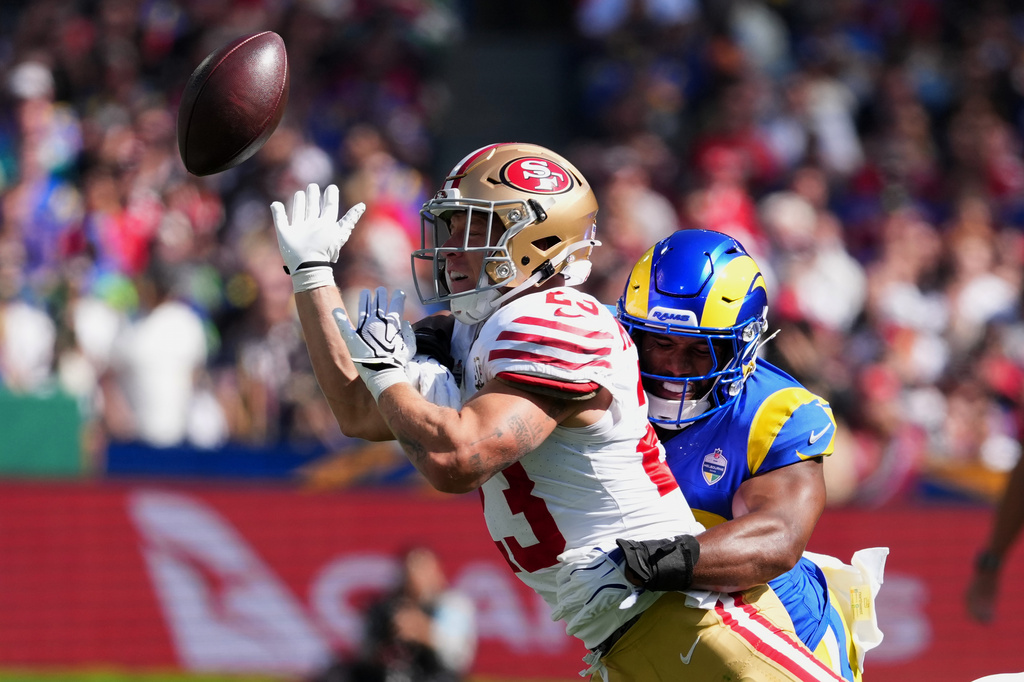 Los Angeles Rams linebacker Omar Speights breaks up a pass intended for San Francisco 49ers running back Christian McCaffrey during the first half of an NFL football game, Friday, Sept. 11, 2026, in Melbourne, Australia. (AP Photo/Scott Barbour)