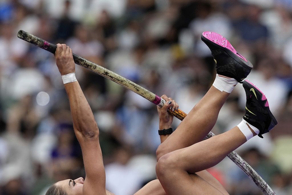 Switzerland's Lea Bachmann makes an attempt in the women's pole vault qualification at the World Athletics Championships in Tokyo, Monday, Sept. 15, 2025. (AP Photo/Matthias Schrader)