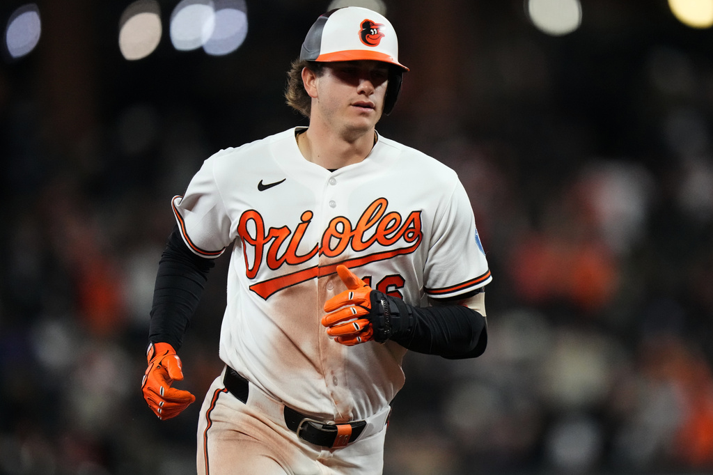 Baltimore Orioles' Coby Mayo rounds the bases after hitting a three-run home run during the seventh inning of a baseball game against the New York Yankees, Monday, May 11, 2026, in Baltimore. (AP Photo/Stephanie Scarbrough)