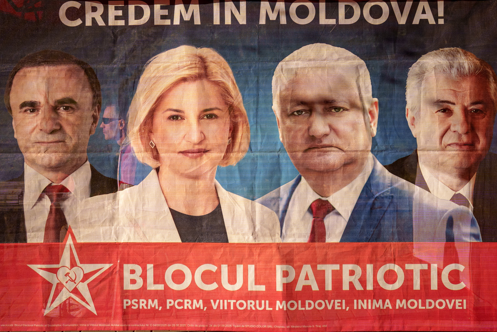 A man seen inside a campaign tent of the Patriotic Electoral Bloc, in Chisinau, Moldova, Friday, Sept. 26, 2025, ahead of parliamentary elections taking place on Sept. 28. (AP Photo/Vadim Ghirda)