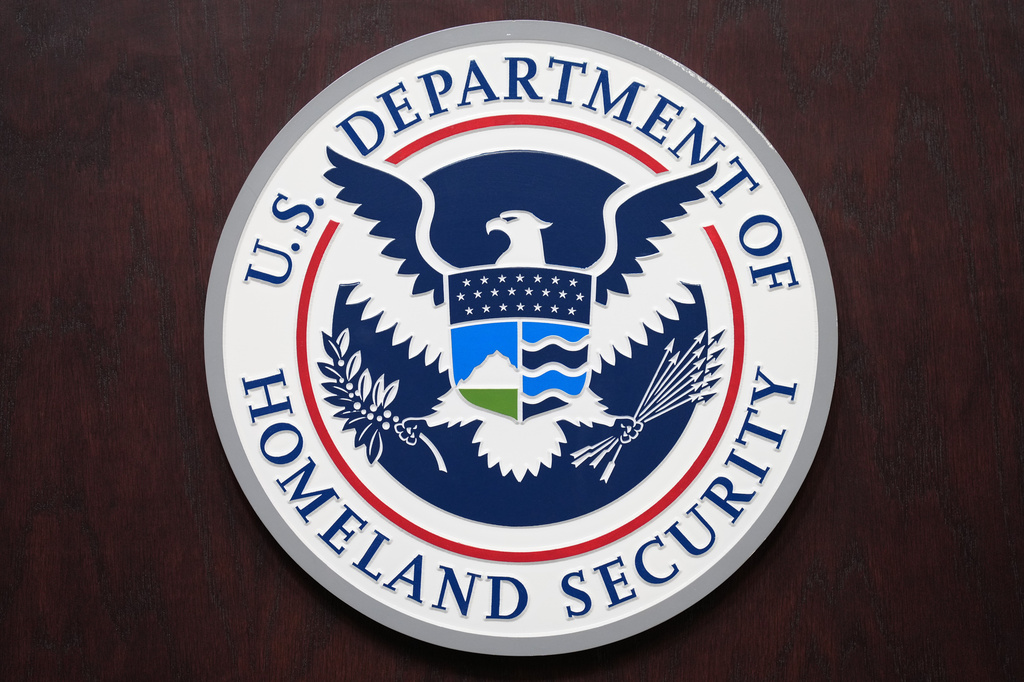 U.S. Department of Homeland Security sign, is seen during a news conference at ICE Headquarters, Friday, Oct. 9, 2026, in Washington. (AP Photo/Jacquelyn Martin)