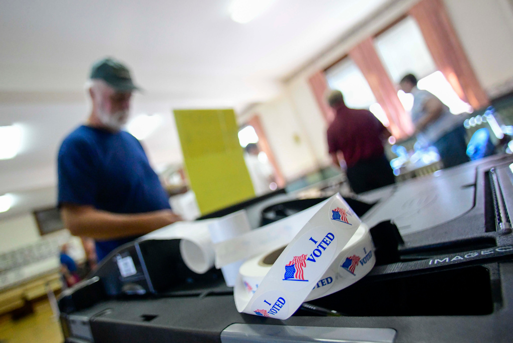 Sean Reid of Rockingham, Vt., casts his ballot at the polling station in Rockingham during Vermont's state and federal primary elections on Tuesday, Aug. 11, 2026. (Kristopher Radder/The Brattleboro Reformer via AP)