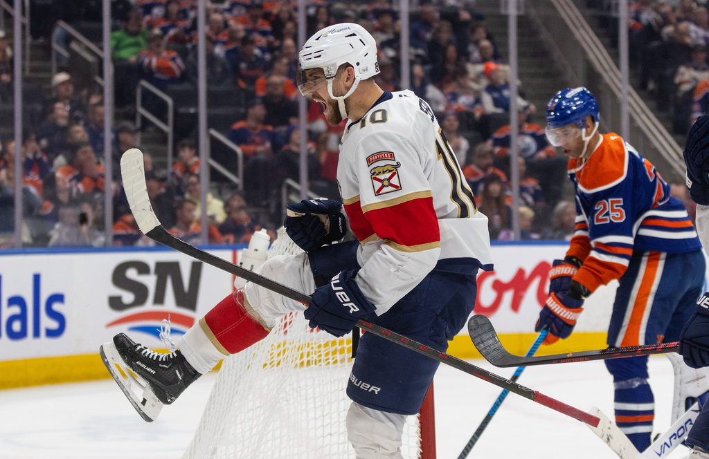 Florida Panthers' A.J. Greer (10) celebrates a goal against the Edmonton Oilers during first period NHL action, in Edmonton on Thursday, March 19, 2026.(Jason Franson/The Canadian Press via AP)