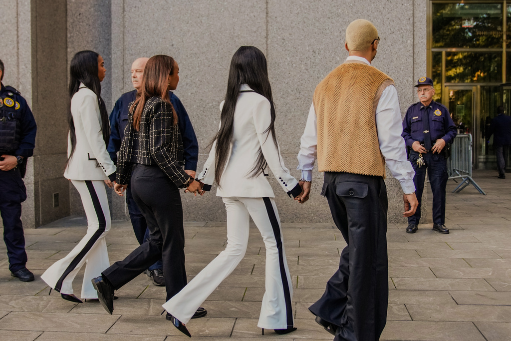 Quincy Brown, Chance Combs, D'lila Combs and Jessie, the children of Sean "Diddy" Combs, arrives to the Manhattan federal court for the sentencing of Sean "Diddy" Combs in New York, Friday, Oct. 3, 2025. (AP Photo/Eduardo Munoz Alvarez)