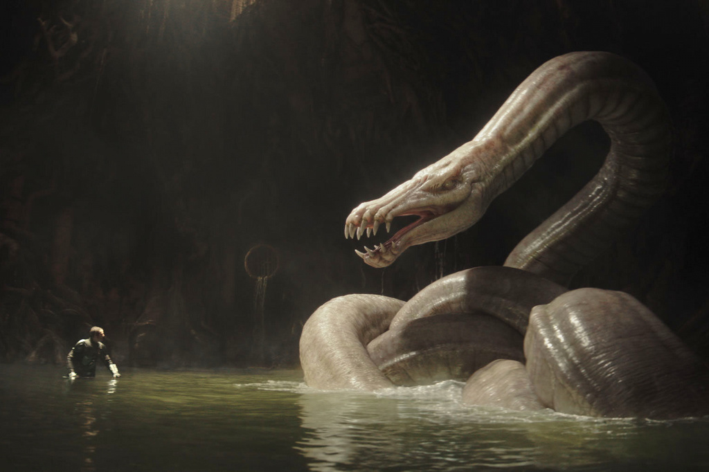 This image released by Disney shows Grogu, left, and Dragonsnake in a scene from Lucasfilm's "Star Wars: The Mandalorian and Grogu." (Lucasfilm Ltd. - Disney via AP)