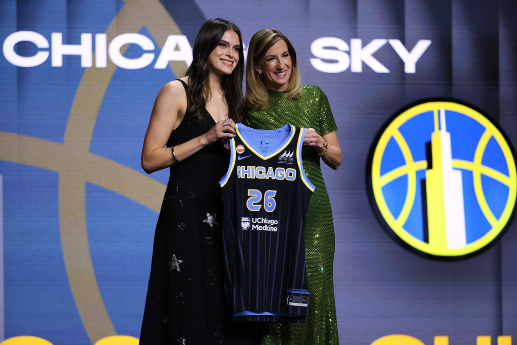 UCLA guard Gabriela Jaquez poses with WNBA commissioner Cathy Engelbert after being selected fifth overall by the Chicago Sky in the first round of the WNBA basketball draft Monday, April 13, 2026, in New York. (AP Photo/Pamela Smith)