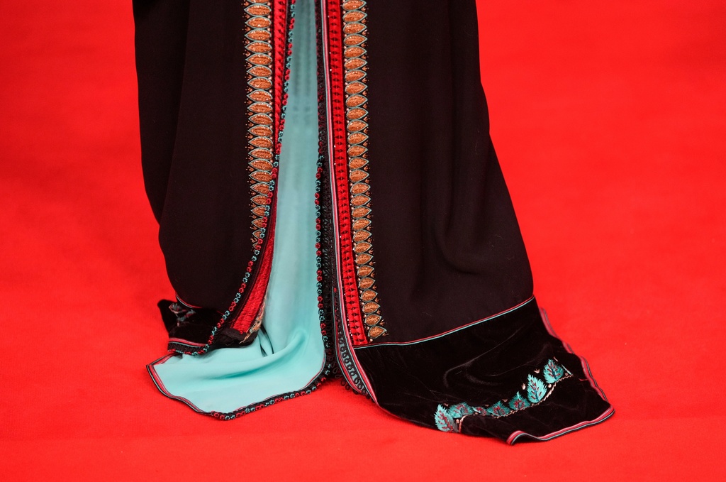 An actress poses for a photo on the red carpet during the 22nd Marrakech Film Festival, in Morocco, Tuesday, Dec. 2, 2025. (AP Photo/Mosa'ab Elshamy)
