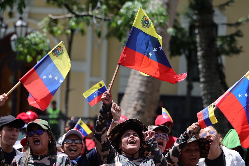 Members of Bolivarian militias gather for military exercises in Caracas, Venezuela, Saturday, Oct. 4, 2025. (AP Photo/Jesus Vargas)