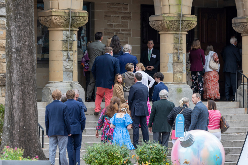 People arrive for a funeral service for Brown University shooting victim Ella Cook, Monday, Dec. 22, 2025, in Birmingham, Ala. (AP Photo/Vasha Hunt)