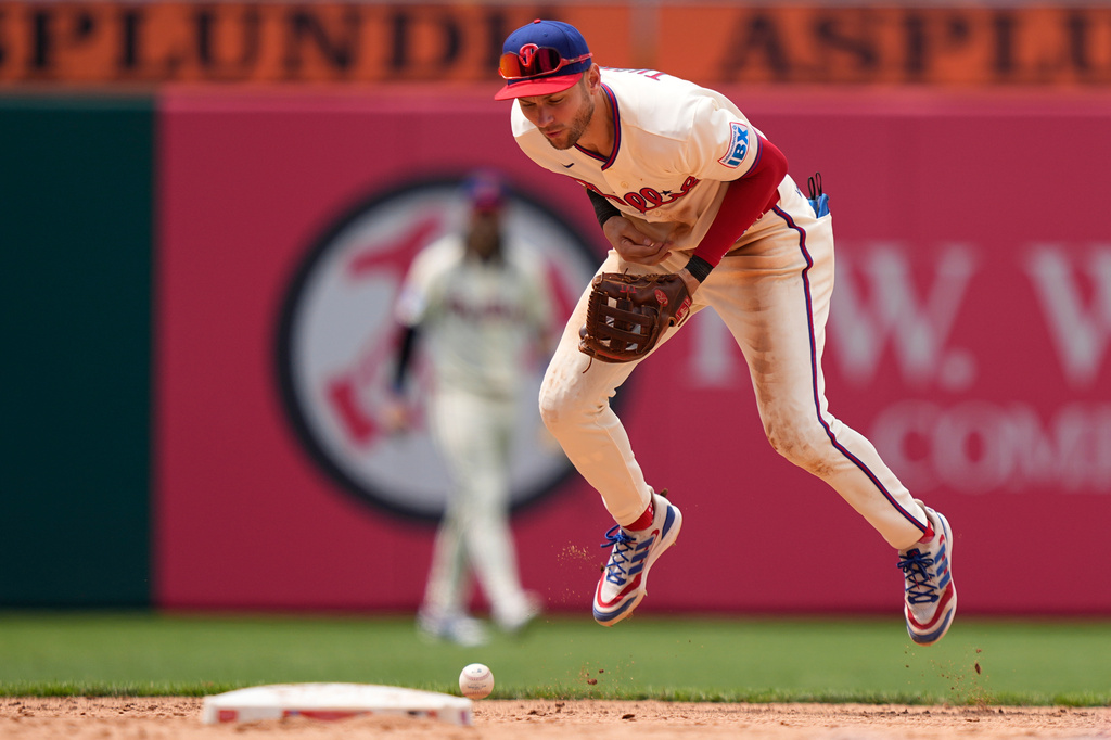 Philadelphia Phillies shortstop Trea Turner fields a gounder by Miami Marlins' Jakob Marsee during the sixth inning of a baseball game Wednesday, June 17, 2026, in Philadelphia. (AP Photo/Matt Slocum)